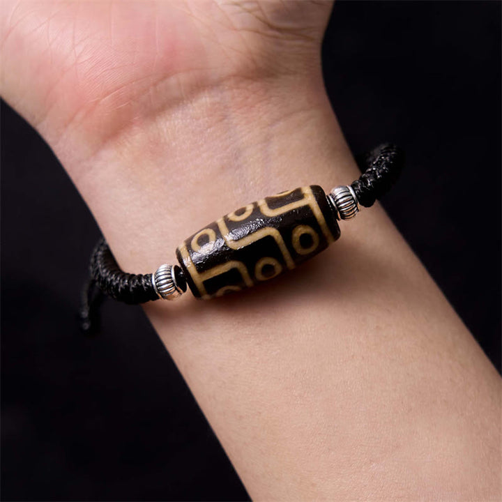 Buddha Stones Tibetano Perlina Dzi a nove occhi Perlina Dzi a tre occhi Braccialetto di corda di protezione della ricchezza