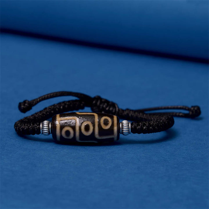 Buddha Stones Tibetano Perlina Dzi a nove occhi Perlina Dzi a tre occhi Braccialetto di corda di protezione della ricchezza