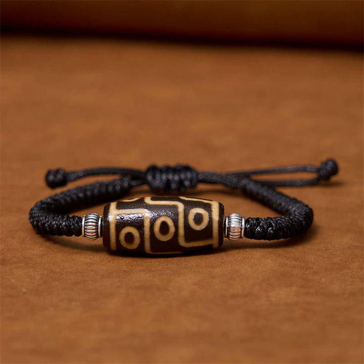 Buddha Stones Tibetano Perlina Dzi a nove occhi Perlina Dzi a tre occhi Braccialetto di corda di protezione della ricchezza