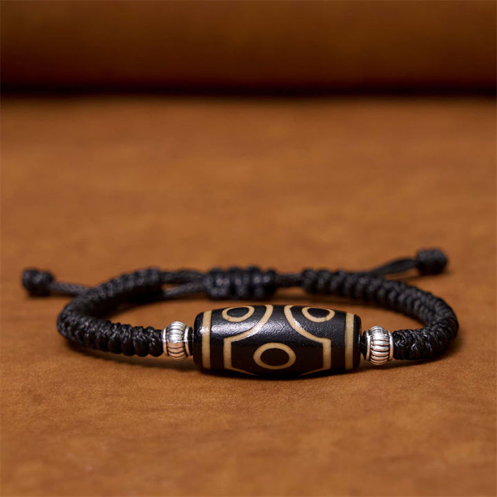 Buddha Stones Tibetano Perlina Dzi a nove occhi Perlina Dzi a tre occhi Braccialetto di corda di protezione della ricchezza