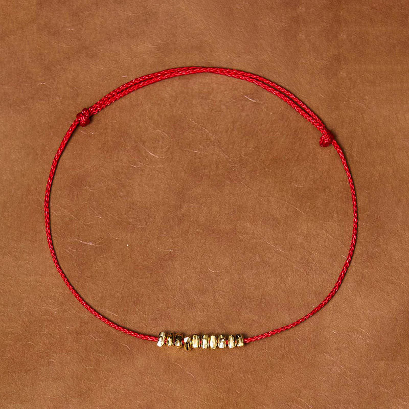 Braccialetto in corda ultra sottile intrecciata con piccoli pezzi di protezione in argento sterling 925 fatto a mano Buddha Stones - Corda oro-rossa (circonferenza polso 14-20 cm) - image 0