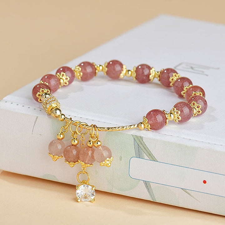 Braccialetto positivo di guarigione di cristallo di quarzo fragola naturale Buddha Stones Zircone