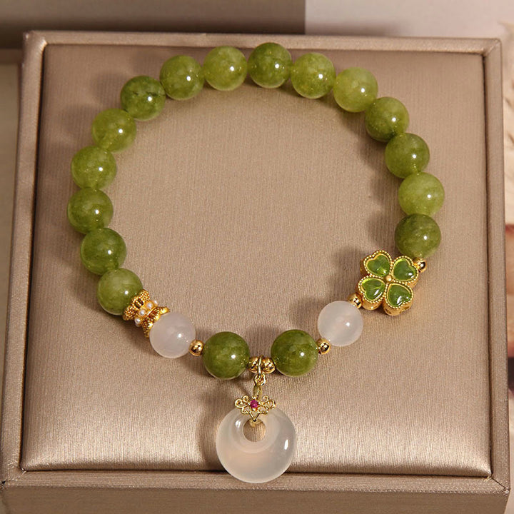 Braccialetto con ciondolo a forma di fibbia della pace con quadrifoglio , Buddha Stones, tormalina verde, calcedonio e saggezza