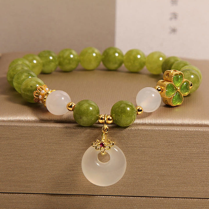 Braccialetto con ciondolo a forma di fibbia della pace con quadrifoglio , Buddha Stones, tormalina verde, calcedonio e saggezza
