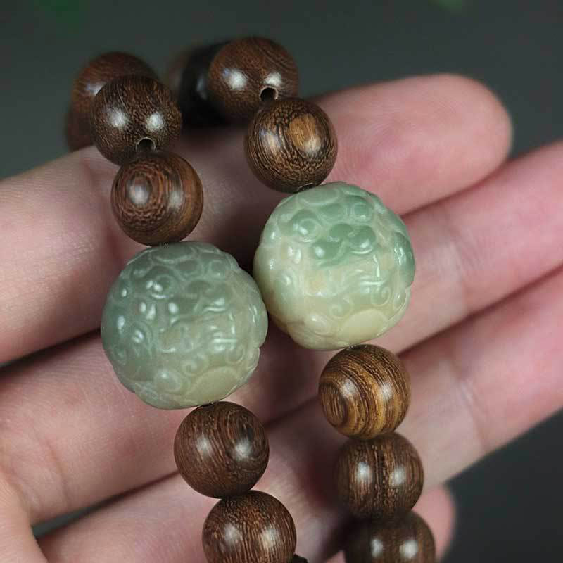 Braccialetto di guarigione con perline di legno di ebano, semi di sandalo Bodhi , Buddha Stones