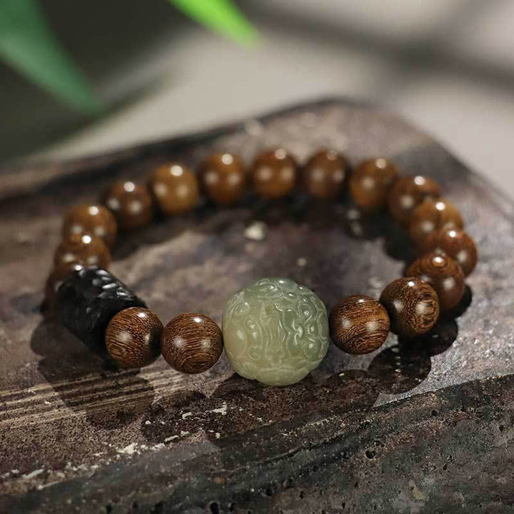Braccialetto di guarigione con perline di legno di ebano, semi di sandalo Bodhi , Buddha Stones
