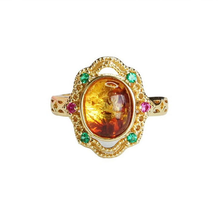 Anello di fiducia in Buddha Stones con fiore di ambra cava in pizzo