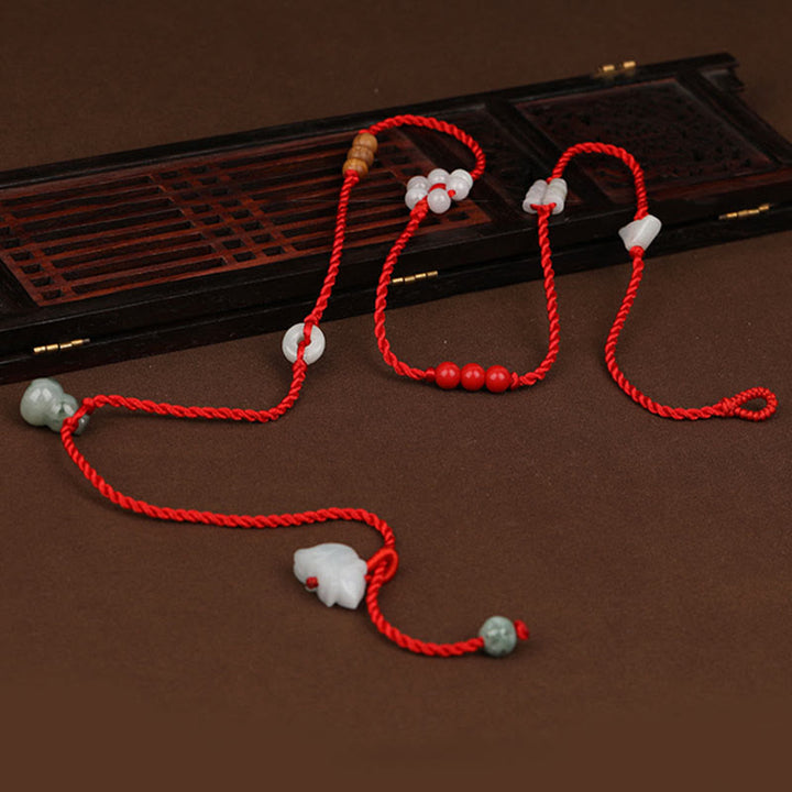 Buddha Stones Zodiaco cinese Legno di pesca Benedizione Catena per la pancia con corda rossa