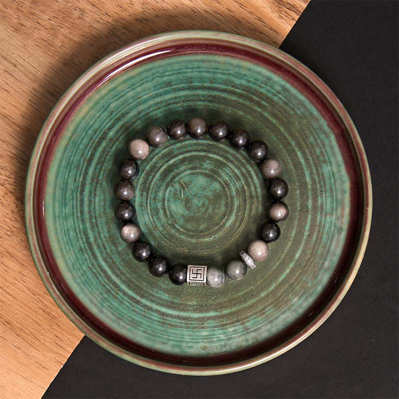 Braccialetto di forza e coraggio in ossidiana nera con occhio d'aquila di Buddha Stones