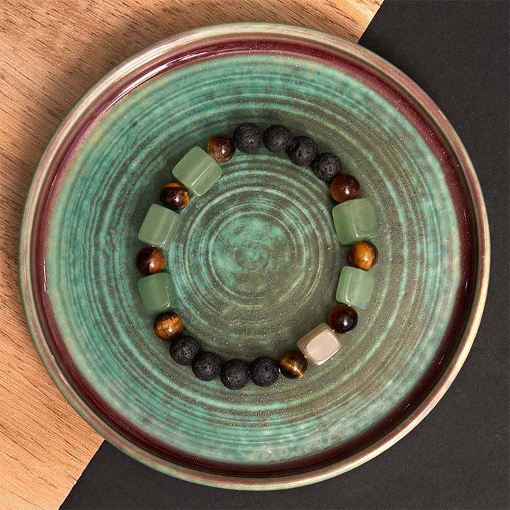 Braccialetto di supporto in pietra lavica con vari cristalli Buddha Stones