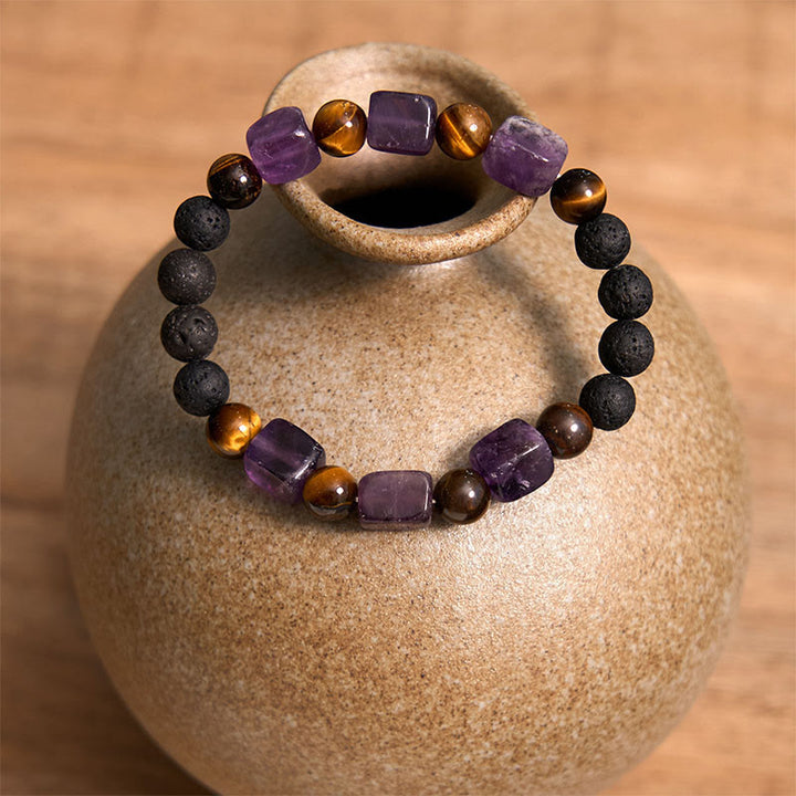 Braccialetto di supporto in pietra lavica con vari cristalli Buddha Stones