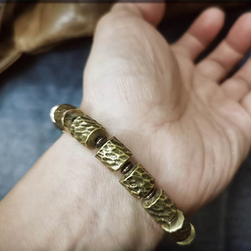 Braccialetto portafortuna con motivo a cratere di meteorite in rame Buddha Stones