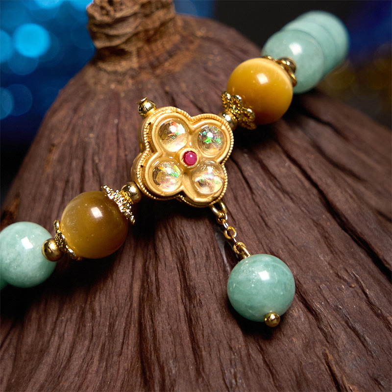 Braccialetto della prosperità con occhio di tigre giallo e giada Buddha Stones