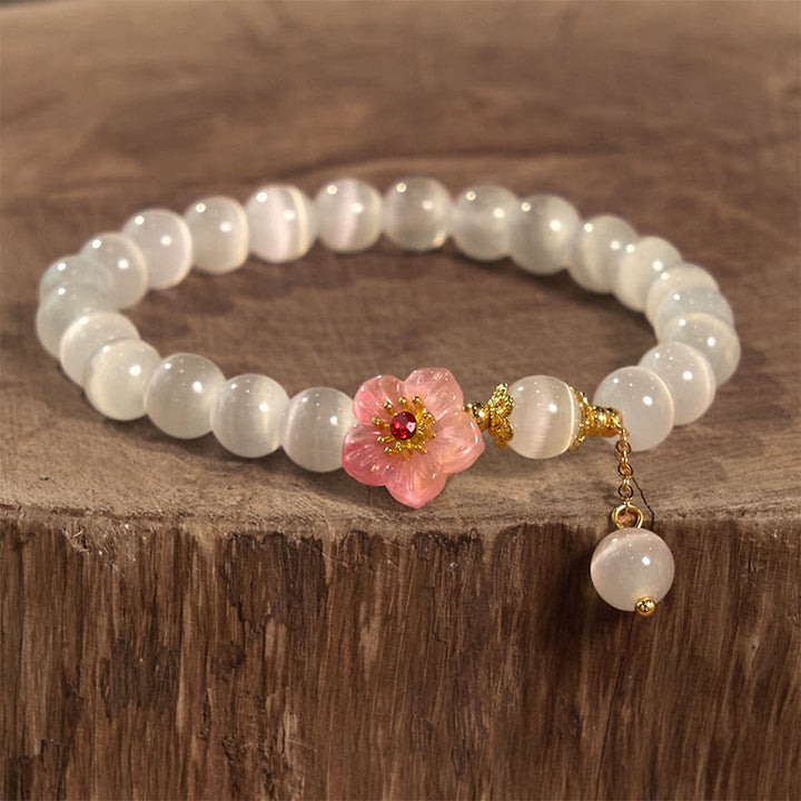 Braccialetto di supporto con fiori rosa e occhio di gatto in crisoberillo Buddha Stones