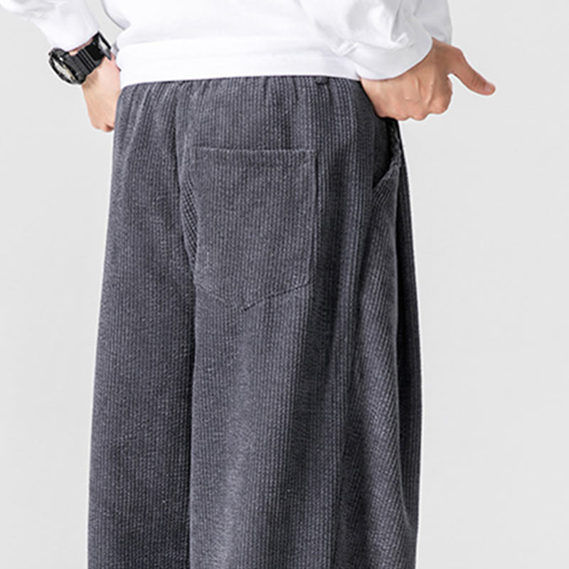 Pantaloni da uomo a gamba larga in velluto a coste tinta unita con motivo Buddha Stones e tasche - image 9