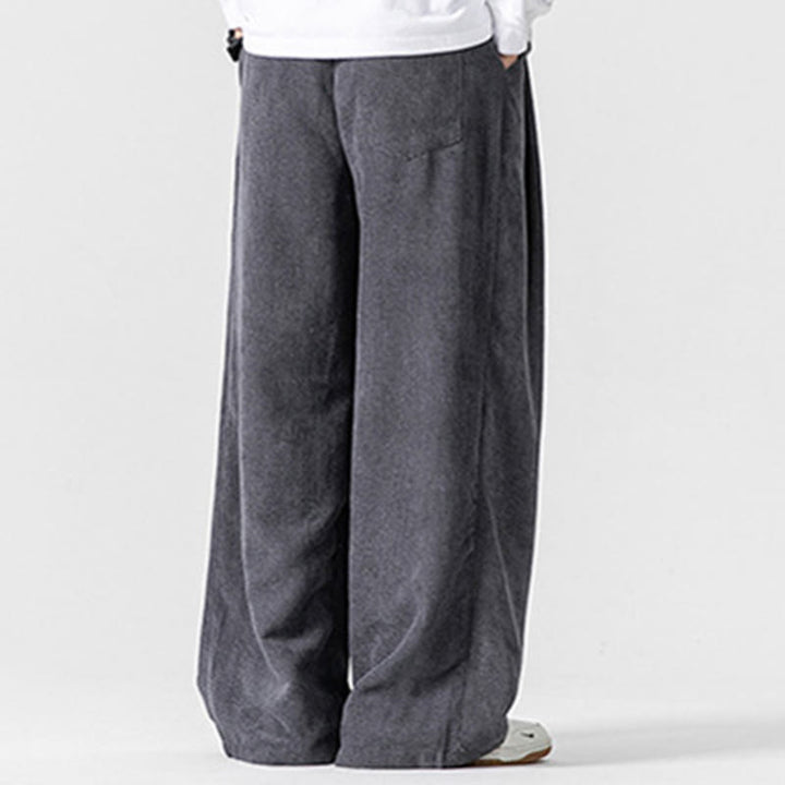 Pantaloni da uomo a gamba larga in velluto a coste tinta unita con motivo Buddha Stones e tasche - image 4