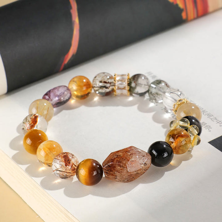 Braccialetto Buddha Stones Super Seven Crystal Topaz Obsidian Tiger Eye Positivity