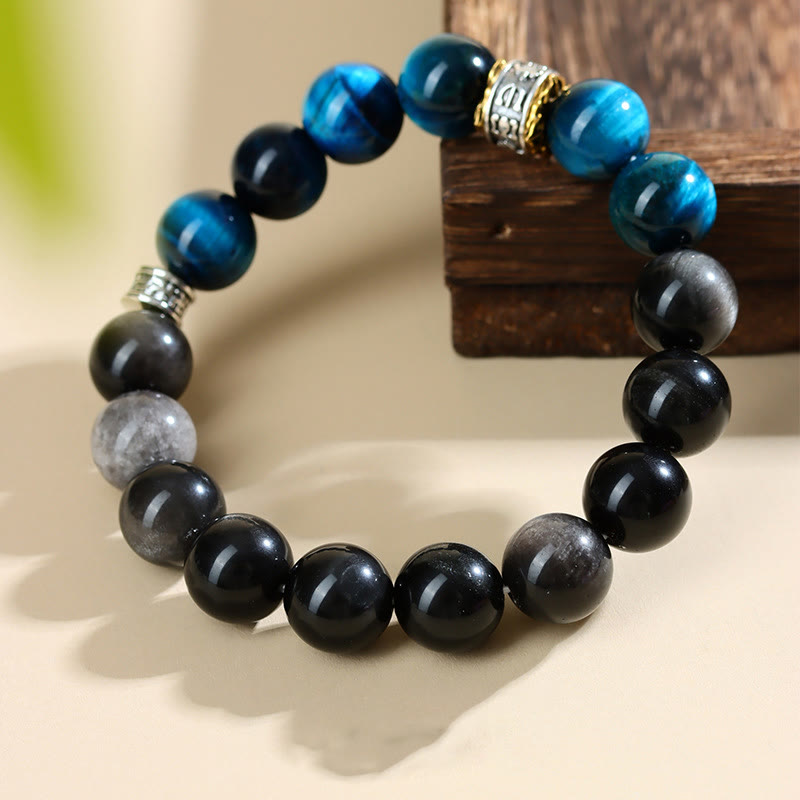 Bracciale Buddha Stones Occhio di Tigre Blu Argento Ossidiana Forza - image 1