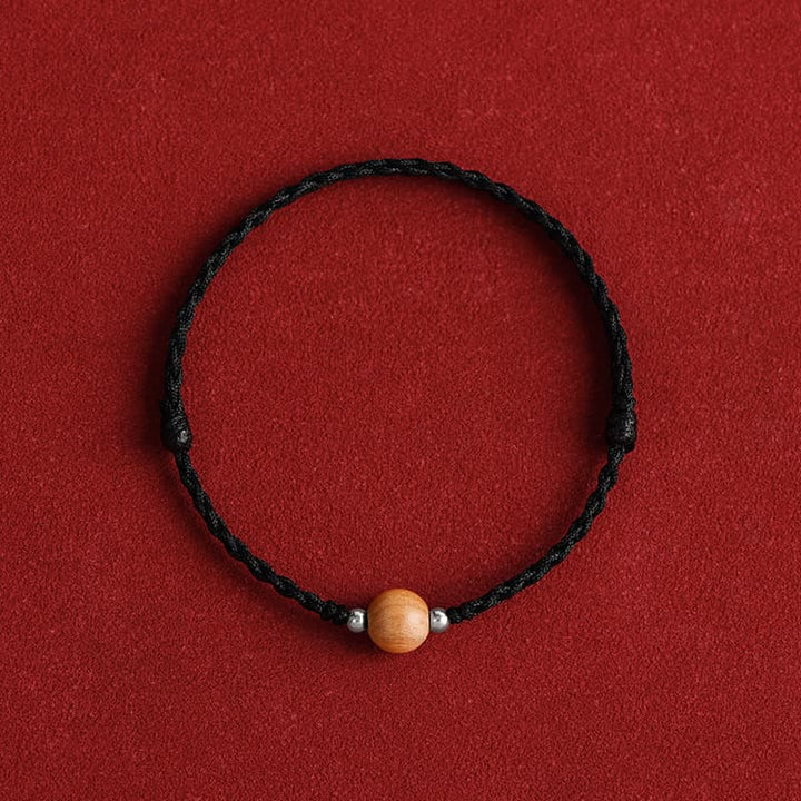 Braccialetto alla caviglia intrecciato con perline di legno di pesca naturale Buddha Stones