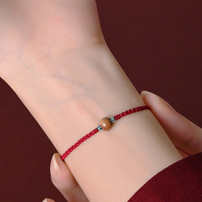 Braccialetto alla caviglia intrecciato con perline di legno di pesca naturale Buddha Stones