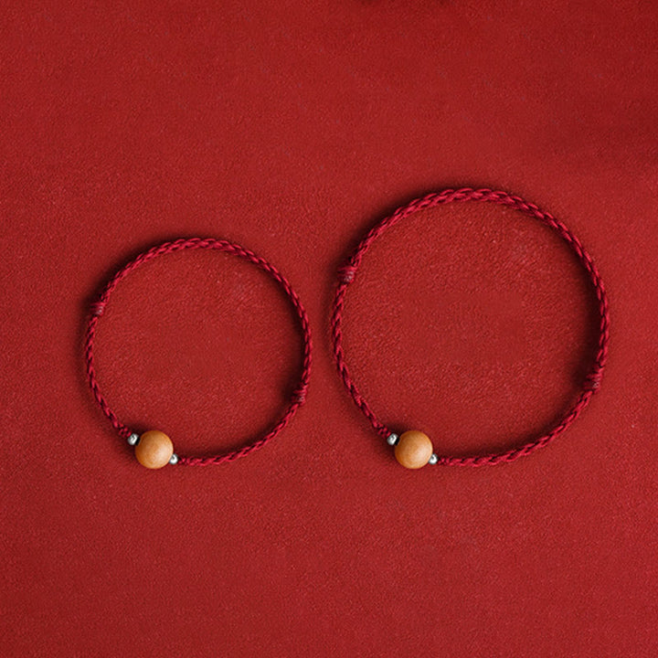 Braccialetto alla caviglia intrecciato con perline di legno di pesca naturale Buddha Stones