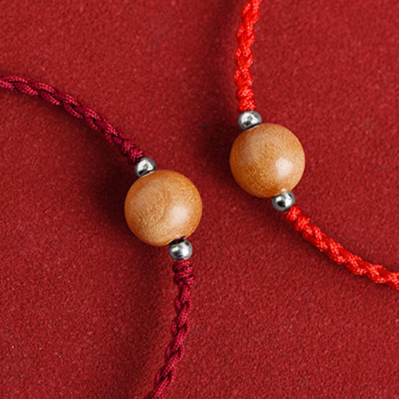 Braccialetto alla caviglia intrecciato con perline di legno di pesca naturale Buddha Stones