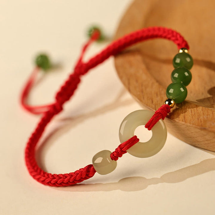 Buddha Stones Pulsera de protección de la suerte con hilo rojo y hebilla de paz de jade hetiano natural