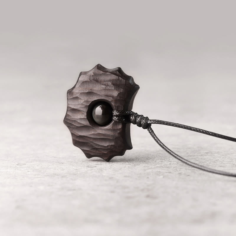 Collana pendente Buddha Stones in legno di ebano e ossidiana di forma irregolare, pace e calma