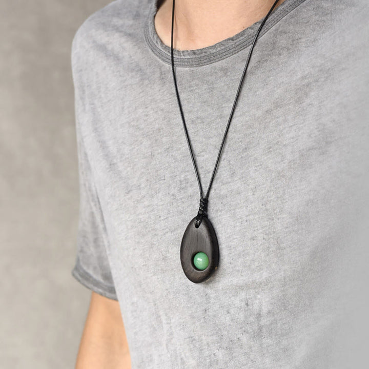 Collana pendente Buddha Stones, legno di ebano, avventurina verde, pace e calma