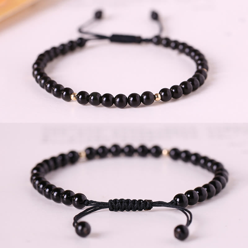 Braccialetto di corda di realizzazione con piccole perle di ossidiana nera Buddha Stones