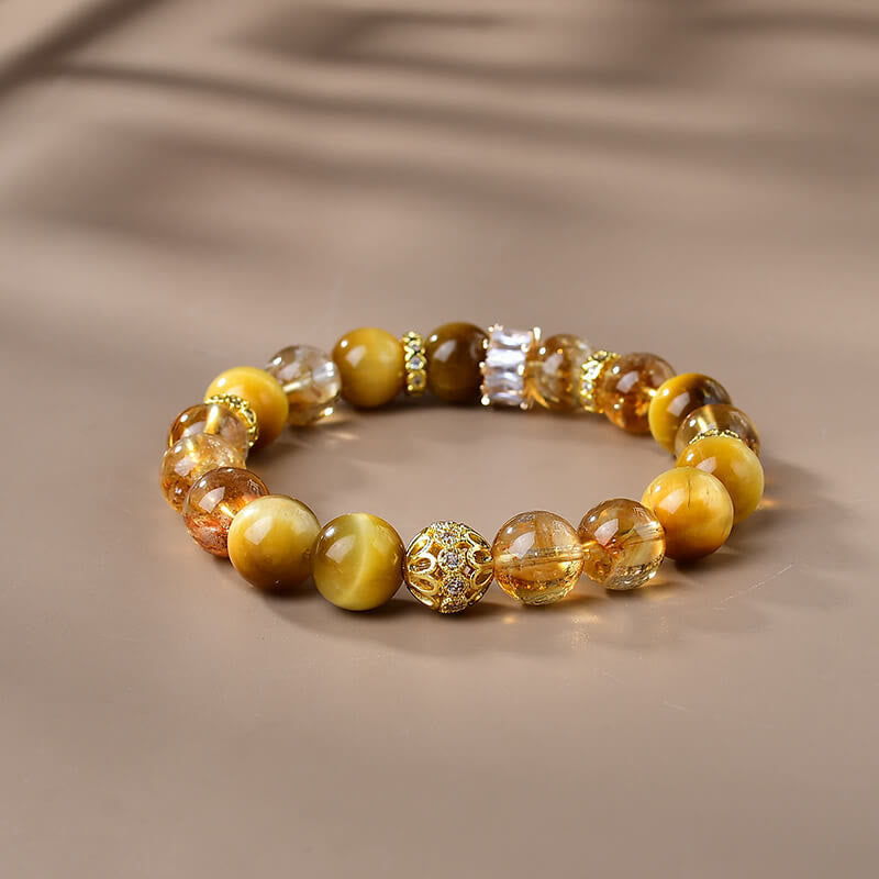 Braccialetto di forza e coraggio con perle di occhio di tigre naturale e citrino Buddha Stones