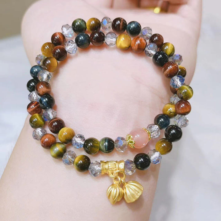 Braccialetto di protezione elastico multi-cerchio con occhio di tigre colorato Buddha Stones Lotus
