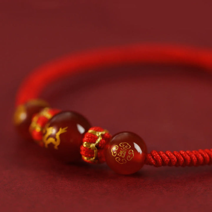 Braccialetto di protezione intrecciato con corda rossa in agata rossa fatto a mano con zodiaco cinese Buddha Stones - image 18