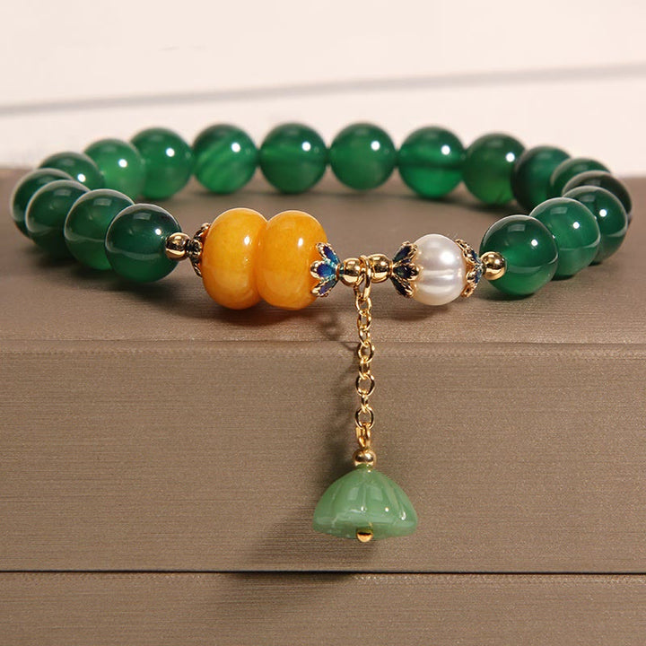 Braccialetto di supporto con baccello di loto in agata verde e perla Buddha Stones