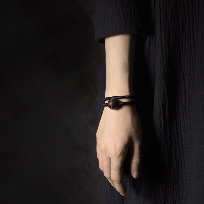 Collana con bracciale a doppio giro in Buddha Stones, in legno di ebano, in ottone e rame, con sfera di equilibrio cubica