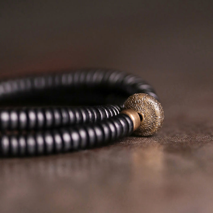 Braccialetto doppio giro Buddha Stones Ebano Legno Rame Ottone Pace
