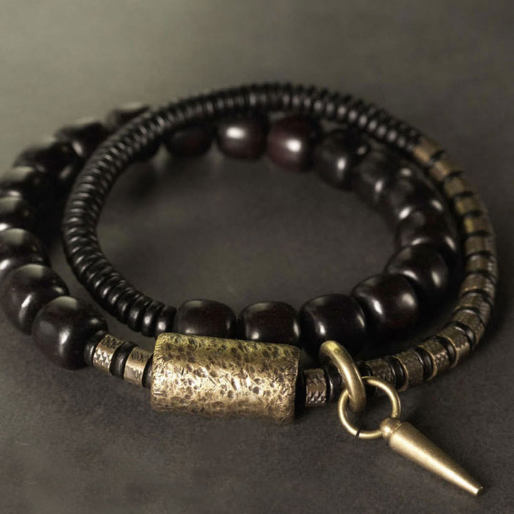 Braccialetto di equilibrio a doppio giro con perline vintage in legno di ebano, ottone e rame Buddha Stones