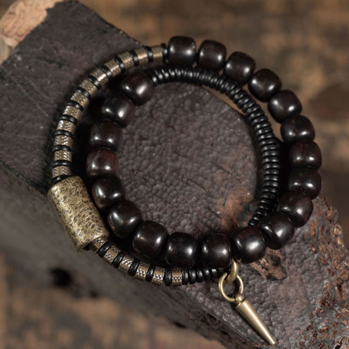 Braccialetto di equilibrio a doppio giro con perline vintage in legno di ebano, ottone e rame Buddha Stones
