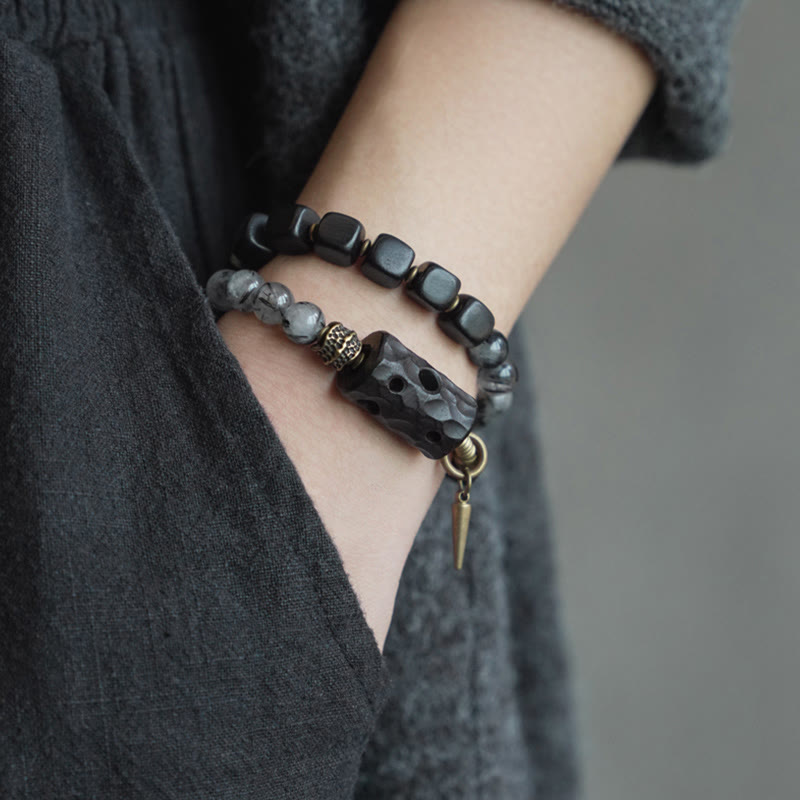 Braccialetto con bilanciere a doppio giro in ottone e rame, in legno di ebano e quarzo rutilato nero Buddha Stones