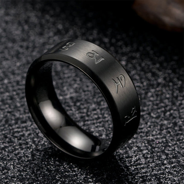 Anello di equilibrio in acciaio al titanio con mantra Jambhala nero Buddha Stones