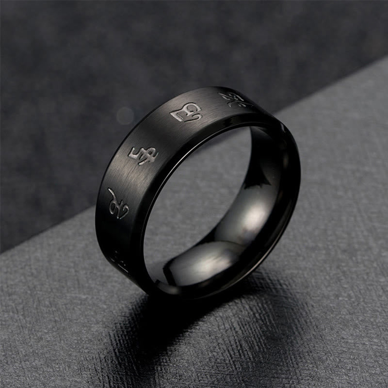 Anello di equilibrio in acciaio al titanio con mantra Jambhala nero Buddha Stones