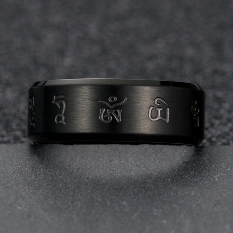 Anello di equilibrio in acciaio al titanio con mantra Jambhala nero Buddha Stones