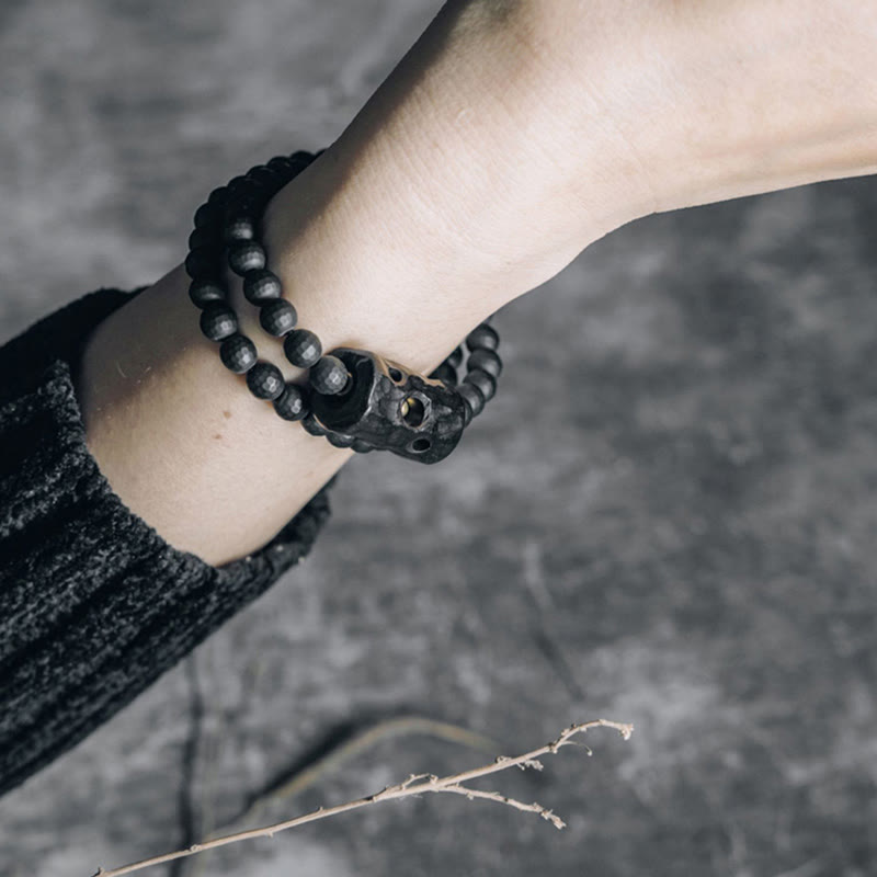 Braccialetto di protezione a doppio giro in onice nero ebano con superficie tagliata smerigliata Buddha Stones