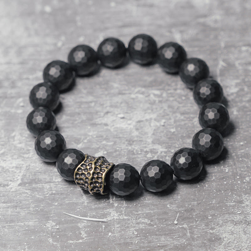 Braccialetto di protezione in ottone e rame con onice nero opaco Buddha Stones
