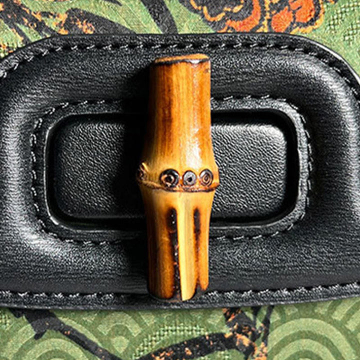 Borsa a tracolla in seta Xiangyunsha con manico in bambù e fiore curvo Buddha Stones