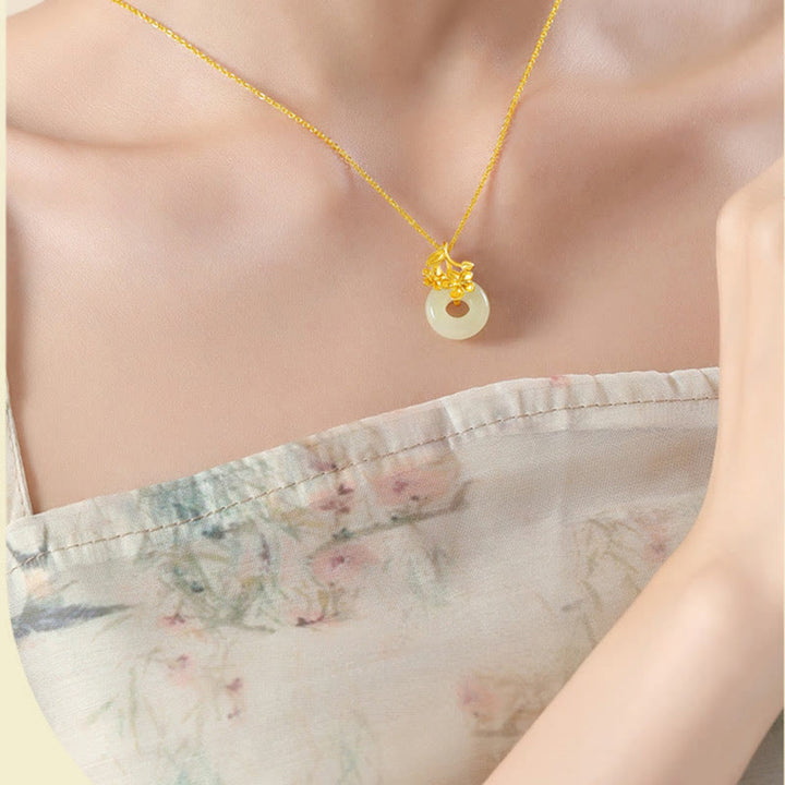 Collana con ciondolo a forma di fiore di pesco, fibbia della pace in argento sterling 999, Buddha Stones, giada di Hetian - image 2