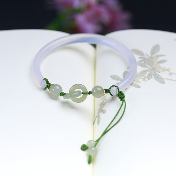 Buddha Stones Braccialetto positivo intrecciato con perle di giada Hetian e agata bianca naturale