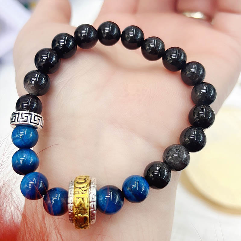 Braccialetto di protezione in occhio di tigre blu ossidiana e argento lucido Buddha Stones