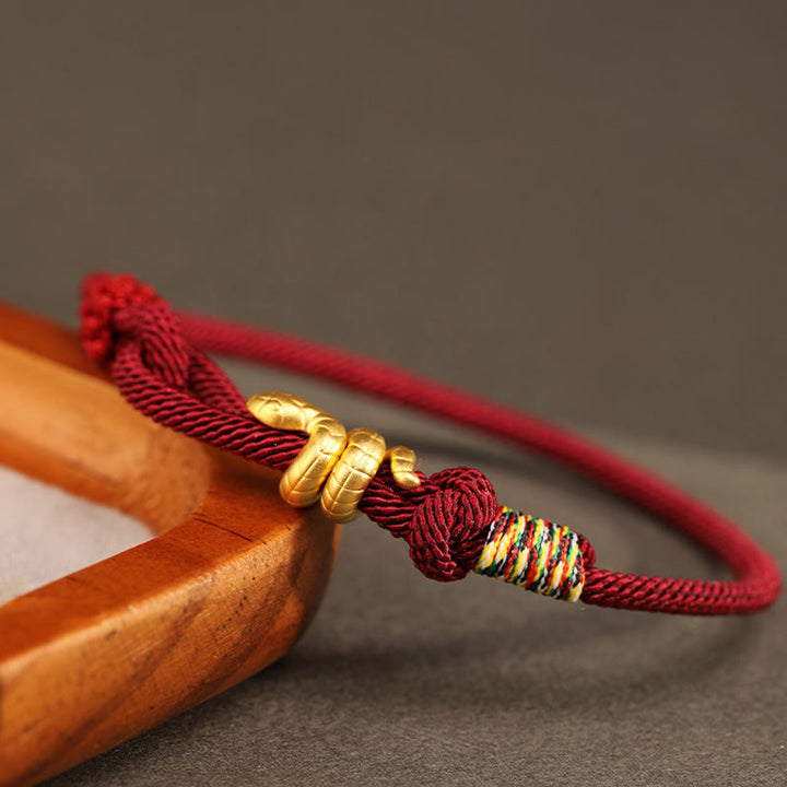 Braccialetto intrecciato con corda di protezione dalla fortuna fatto a mano con design dell'anno del serpente , Buddha Stones , oro 999 - image 2
