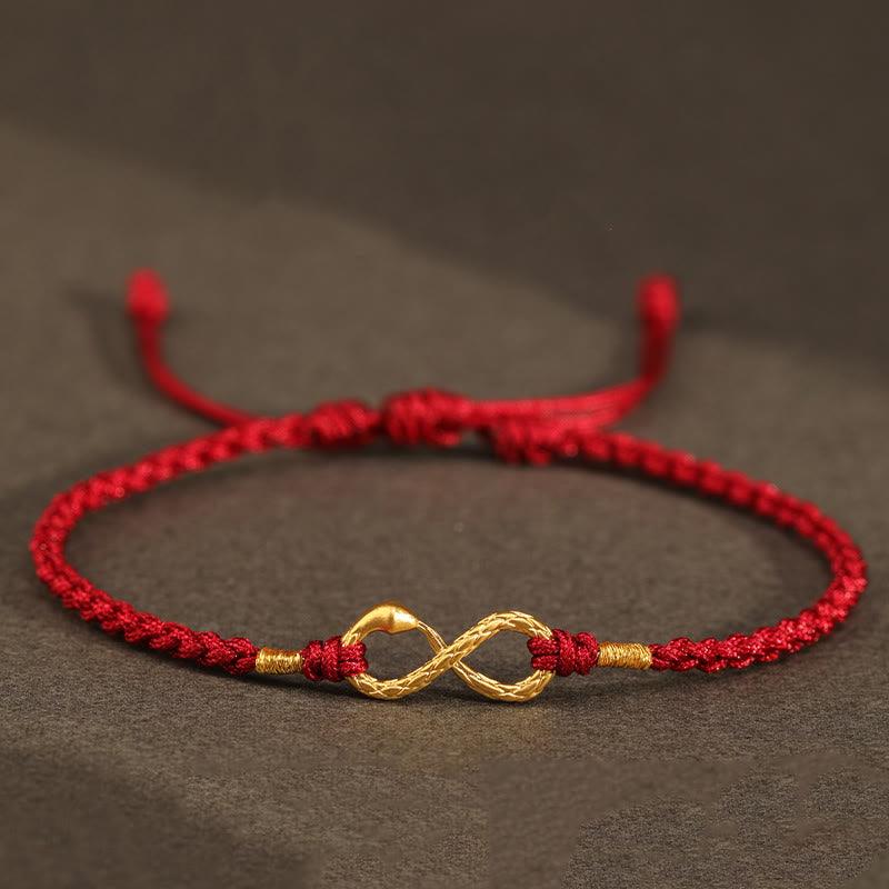 Buddha Stones 999 Oro Anno del Serpente Eterno Nodo Infinito Braccialetto Fatto a Mano della Fortuna - Serpente d'oro 999 - Rosso scuro (circonferenza polso 14-18 cm) - image 0